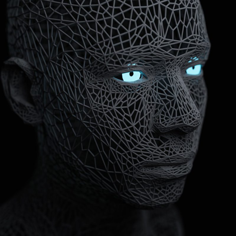 a man with blue eyes and a black background