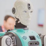 a person wearing a white mask